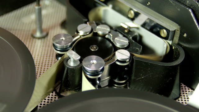 16 mm Film is Rotated in a Movie Camera