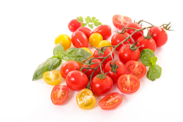 variety of tomatoes on white