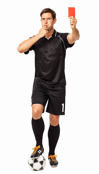 istock Soccer Referee With Ball Showing Red Card 545980556