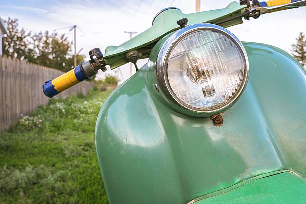 istock Green vintage scooter in grass 545981792