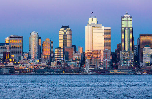 istock Seattle Elliott Bay waterfront skyline and office buildings at sunset 545982474