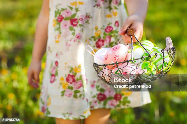 Close Up Of Colorful Easter Eggs In A Basket Stock Photo - Download Image Now - Baby - Human Age, Baby Girls, Basket