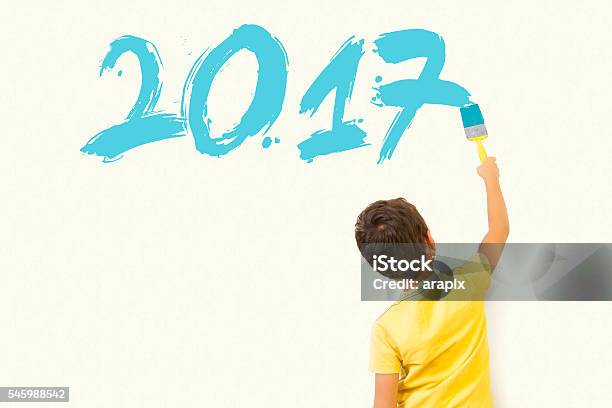 Cute Little Kid Drawing New Year 2017 Stock Photo - Download Image Now - 2016, 2017, Adult