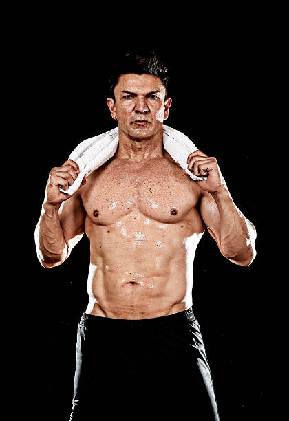 istock attractive sport man with fit strong bodybuilder body posing corporate 545990562