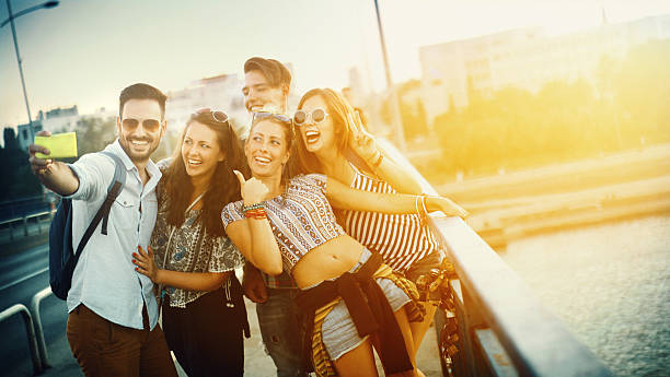 istock Friends taking selfies outdoors. 545992146