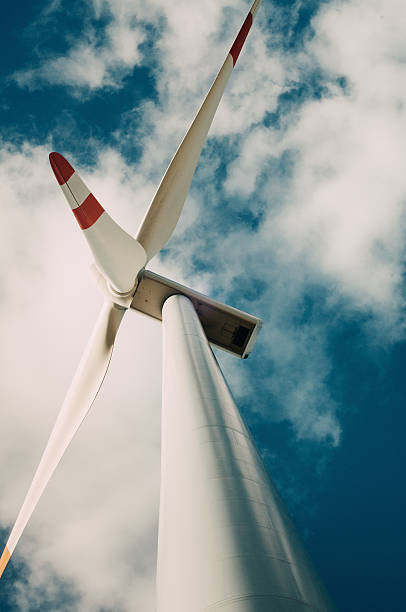 istock Wind turbine with dark blue sky 545992284