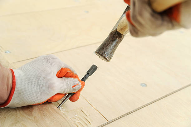 istock Laying hardwood parquet. 545992618