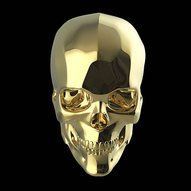 istock golden shiny polished metal skull render isolated on black background 545993912