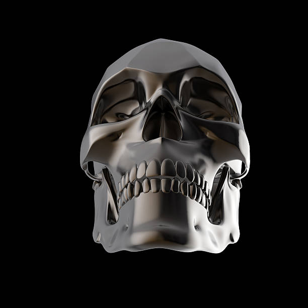 istock dark shiny polished metal skull render isolated on black background 545994190