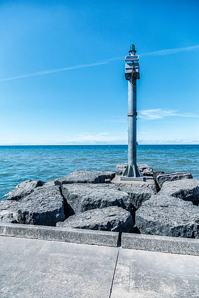 istock Solar Powered Emergency Warning Light on Lake Ontario Fishing Jetty 545996752
