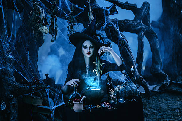 witch to conjure and decided fashionable toning,creative computer colors,On the eve of Hello ween witch to conjure and decided to cook a potion in the tank, standing near the mystical  lake. cauldron photos stock pictures, royalty-free photos & images