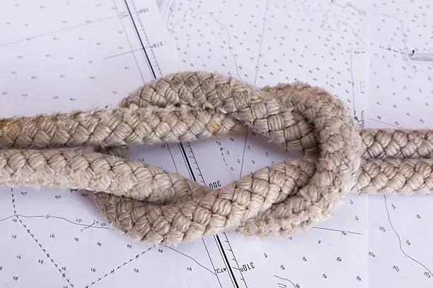 Maritime knots photographed on nautical paper