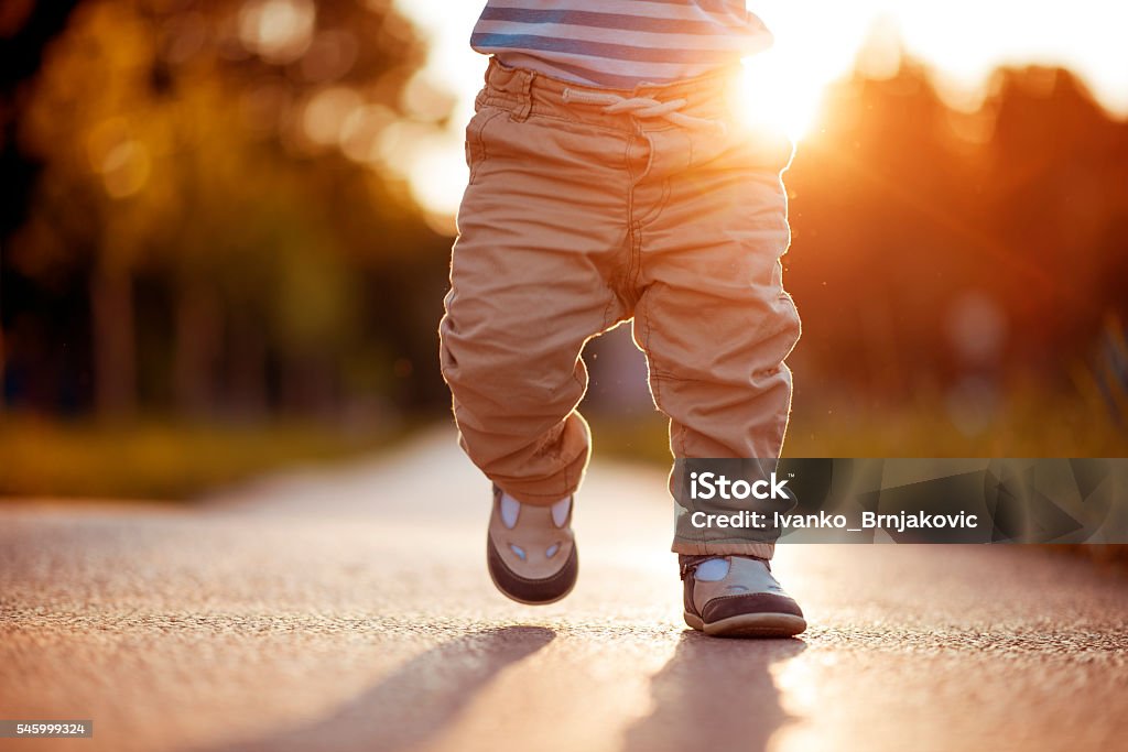 Baby's first steps Baby's first steps.The first independent steps. Walking Stock Photo