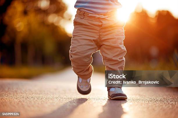 Babys First Steps Stock Photo - Download Image Now - Walking, Child, Baby - Human Age