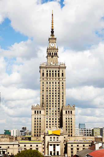 Palace Of Culture And Science against the cloudy sky.
