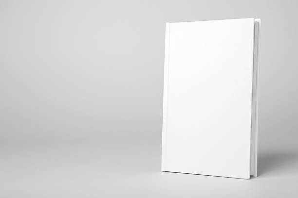 istock Real hardcover white book on a gray background 546001484