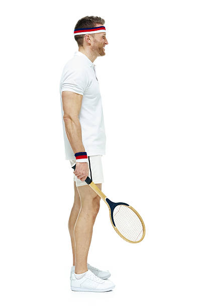 istock Smiling tennis player standing and looking away 546002298