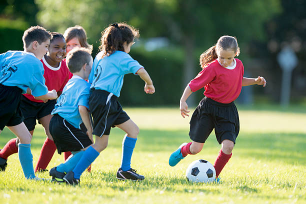 istock Kicking a Ball Up the Field 546003488
