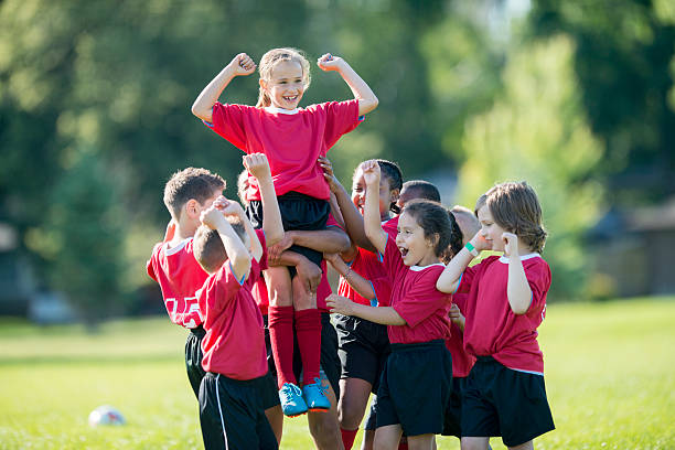 istock Lifting a Teammate up in the Air 546003510