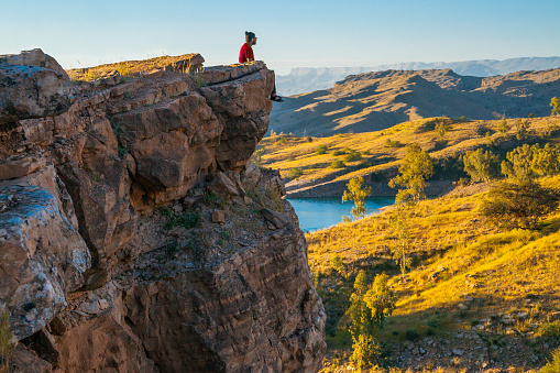 The man sitting on edge on grief