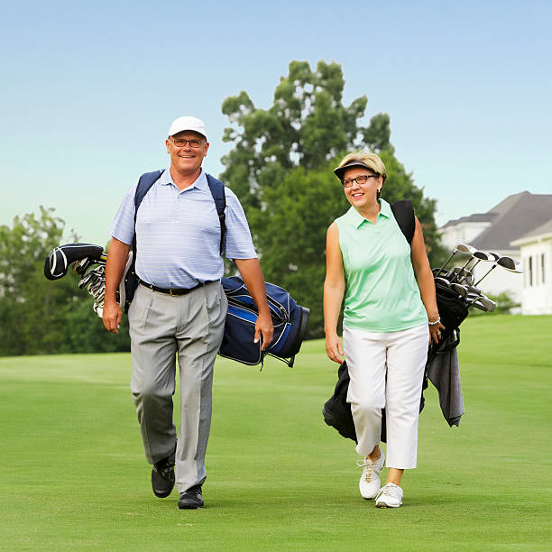 istock Husband and WIfe Playing Golf 546009950