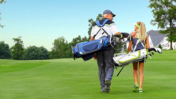 istock Father and Daughter Playing Golf 546009956