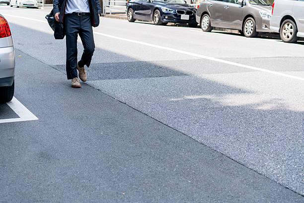 istock Asian businessman walking on the road 546012596