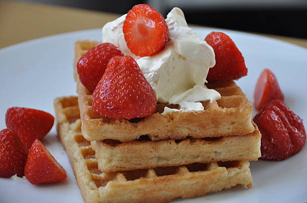 istock Waffles, strawberries and cream 546012620