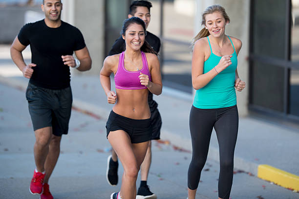 istock Friends Jogging Through the City 546013450