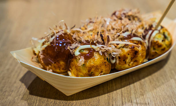 Takoyaki Traditional japanese food or snack: Takoyaki cooking takoyaki is a ball shaped japanese snack stock pictures, royalty-free photos & images