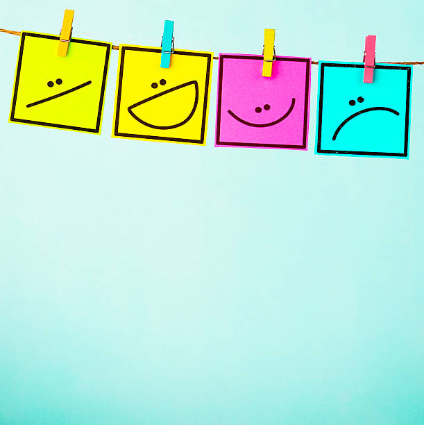 istock Choose your mood. Four different emotions on colored cards 546014312