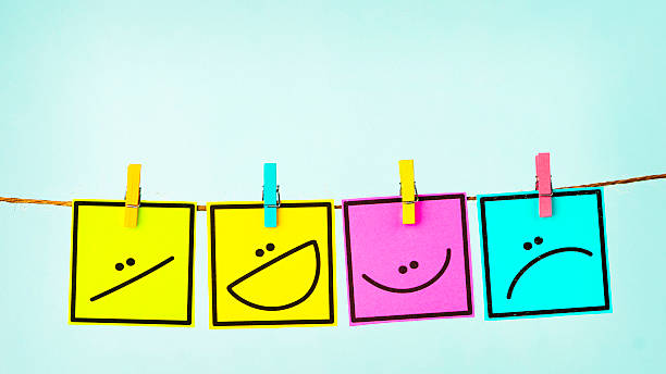 istock Choose your mood. Four different emotions on colored cards 546014962