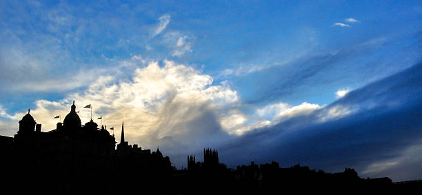 istock Edinburgh skyline at sunset with a blue sky 546015550