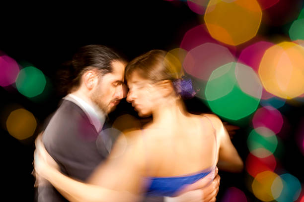 istock Couple dancing tango in Buenos Aires blurred motion 546016430