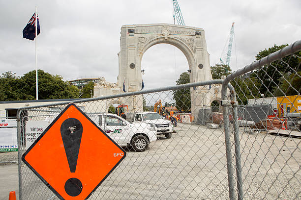 Arch of the Bridge of Remembrance in Christchurch under repair Christchurch, New Zealand - February 22, 2016: The arch of the Bridge of Remembrance in Christchurch under repair after the 2011 earthquake, shot five years after the disaster.  christchurch earthquake stock pictures, royalty-free photos & images