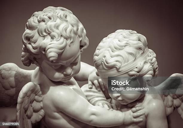 Beautiful Marble Statue Of Two Angels Stock Photo - Download Image Now - Angel, Backgrounds, Cemetery