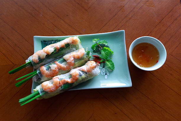 istock rolls with shrimp by paper rice and sauce 546019820