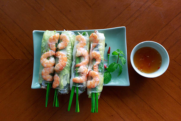 istock rolls with shrimp by paper rice and sauce 546019826