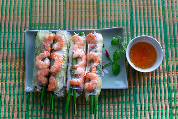 istock rolls with shrimp by paper rice and sauce 546019882