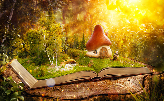 Magical mushroom house on pages of opened book in a fantastic forest.
