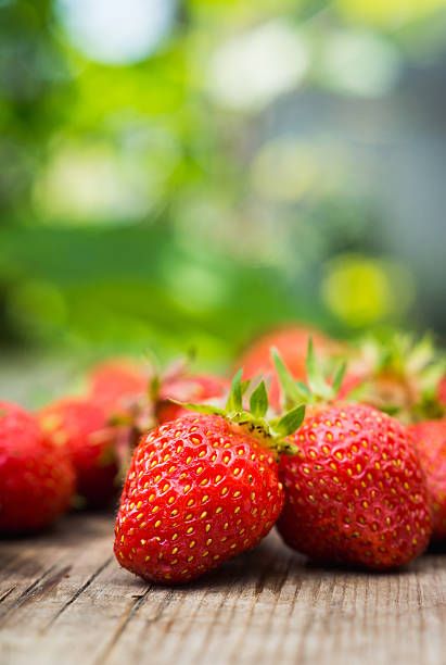 istock Ripe strawberries on the wooden table 546022584