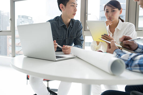 istock People who have a meeting while looking at the tablet 546023200