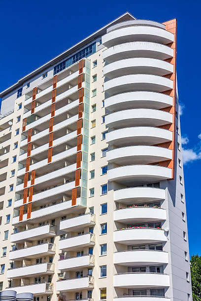 istock Balconies in white modern apartment building, Poland 546023238