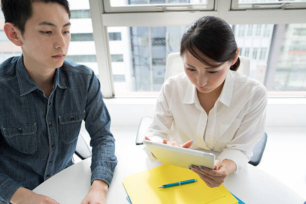 istock Businesswoman with a meeting while using the tablet 546024022