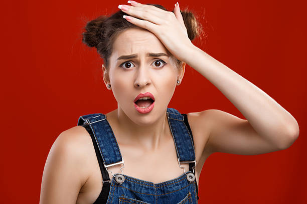 istock Brunette girl posing like she forgot something 546024602