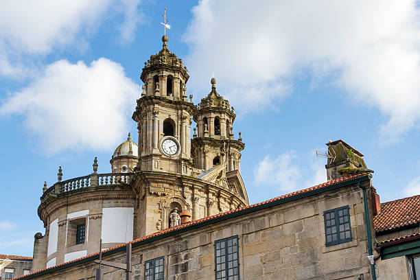 Bell towers of Pilgrim Virgin emerging over the rooftops of buildings in Pontevedra city