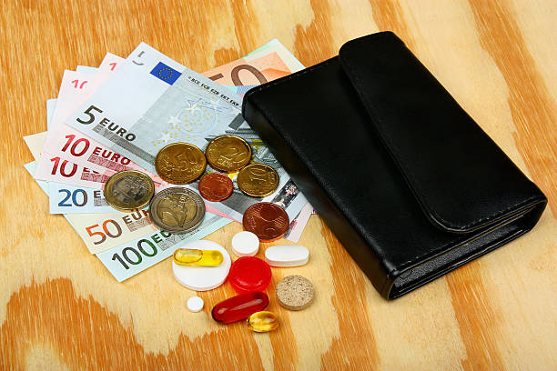 istock Pills, euro money and wallet 546024938