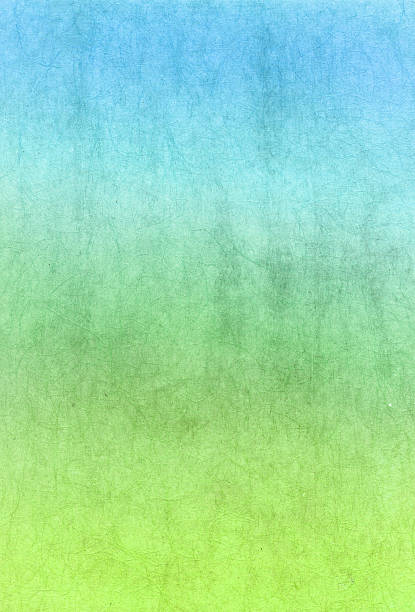 istock Japanese paper colored gradation blue and green, close up 546025536