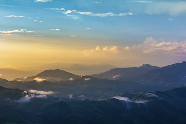 istock light burst at tropical rain forest and mountain landscape 546026994