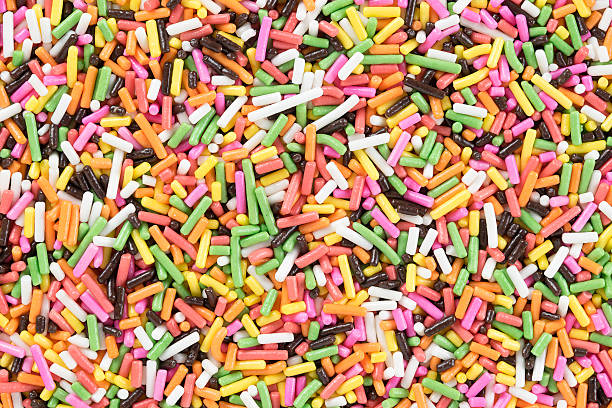 istock Colorful candy sprinkles background. Top view 546163152